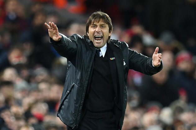 Chelsea's Italian head coach Antonio Conte gestures on the touchline during the English Premier League football match between Liverpool and  Chelsea at Anfield in Liverpool, north west England on November 25, 2017. / AFP PHOTO / Paul ELLIS / RESTRICTED TO EDITORIAL USE. No use with unauthorized audio, video, data, fixture lists, club/league logos or 'live' services. Online in-match use limited to 75 images, no video emulation. No use in betting, games or single club/league/player publications.  /         (Photo credit should read PAUL ELLIS/AFP/Getty Images)