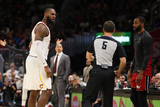 CLEVELAND, OH - NOVEMBER 28:  LeBron James #23 of the Cleveland Cavaliers is ejected in the second half by referee Kane Fitzgerald #5 while playing the Miami Heat  at Quicken Loans Arena on November 28, 2017 in Cleveland, Ohio. Cleveland won the game 108-97. NOTE TO USER: User expressly acknowledges and agrees that, by downloading and or using this photograph, User is consenting to the terms and conditions of the Getty Images License Agreement.  (Photo by Gregory Shamus/Getty Images)