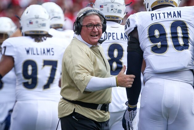 MADISON, WI - SEPTEMBER 10:  Head coach Terry Bowden of the Akron Zips congratulates his team in the first quarter against the Wisconsin Badgers at Camp Randall Stadium on September 10, 2016 in Madison, Wisconsin. (Photo by Dylan Buell/Getty Images)