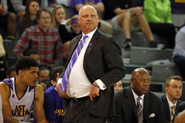 East Carolina head coach Jeff Lebo, center, watches from the sideline during the first half of an NCAA college basketball game against the Cincinnati in Greenville, N.C., Sunday, Jan. 15, 2017. (AP Photo/Karl B DeBlaker)