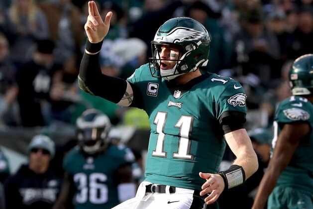 PHILADELPHIA, PA - NOVEMBER 26:  Carson Wentz #11 of the Philadelphia Eagles celebrates his first down carry in the second quarter against the Chicago Bears on November 26, 2017  at Lincoln Financial Field in Philadelphia, Pennsylvania.  (Photo by Elsa/Getty Images)
