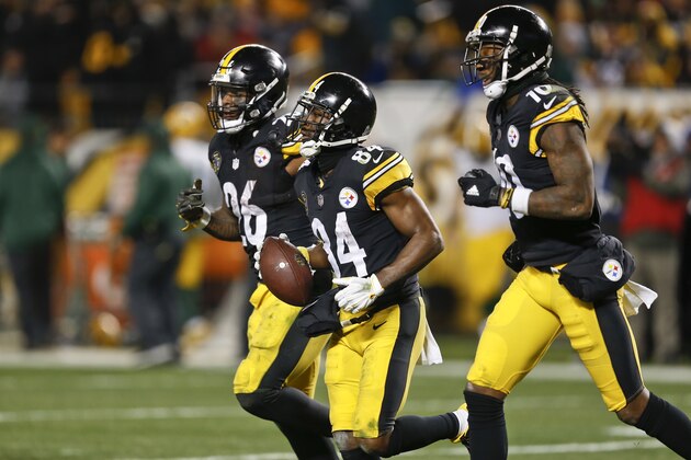 Pittsburgh Steelers wide receiver Antonio Brown (84) comes off the field with running back Le'Veon Bell (26) and fellow wide receiver Martavis Bryant (10) after scoting a touchdown in an NFL football game against the Green Bay Packers, Sunday, Nov. 26, 2017, in Pittsburgh. (AP Photo/Keith Srakocic)