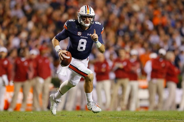 AUBURN, AL - NOVEMBER 25:  Jarrett Stidham #8 of the Auburn Tigers rushes during the fourth quarter against the Alabama Crimson Tide at Jordan Hare Stadium on November 25, 2017 in Auburn, Alabama.  (Photo by Kevin C. Cox/Getty Images)
