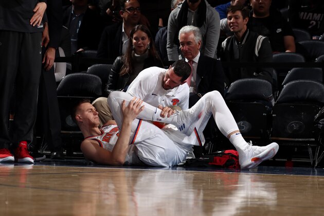 NEW YORK, NY - NOVEMBER 29: Kristaps Porzingis #6 of the New York Knicks is injured during the 1st quarter of the game against the Miami Heat on November 29, 2017 at Madison Square Garden in New York, New York. NOTE TO USER: User expressly acknowledges and agrees that, by downloading and or using this Photograph, user is consenting to the terms and conditions of the Getty Images License Agreement. Mandatory Copyright Notice: Copyright 2017 NBAE (Photo by Nathaniel S. Butler/NBAE via Getty Images)