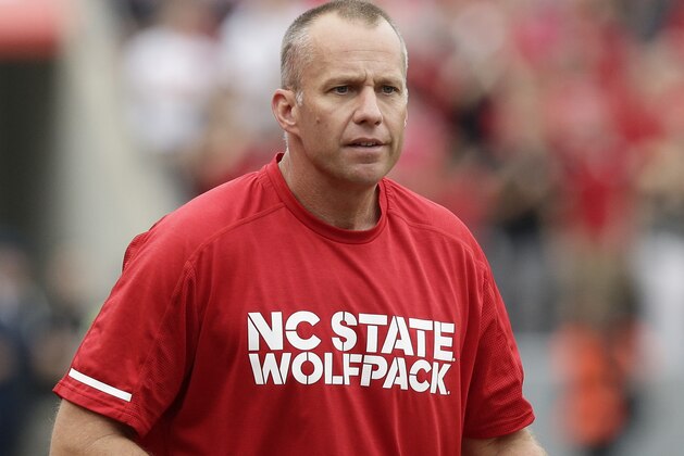North Carolina State head coach Dave Doeren reacts during the first half of an NCAA college football game against Clemson in Raleigh, N.C., Saturday, Nov. 4, 2017. (AP Photo/Gerry Broome)