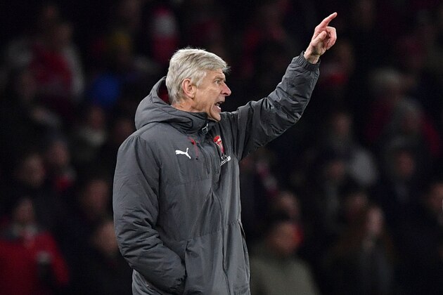 Arsenal's French manager Arsene Wenger gestures from the touchline during the English Premier League football match between Arsenal and Huddersfield Town at the Emirates Stadium in London on November 29, 2017.  / AFP PHOTO / Ben STANSALL / RESTRICTED TO EDITORIAL USE. No use with unauthorized audio, video, data, fixture lists, club/league logos or 'live' services. Online in-match use limited to 75 images, no video emulation. No use in betting, games or single club/league/player publications.  /         (Photo credit should read BEN STANSALL/AFP/Getty Images)