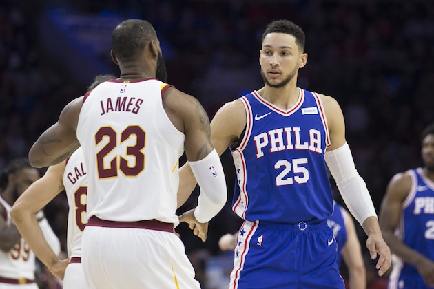 PHILADELPHIA, PA - NOVEMBER 27: LeBron James #23 of the Cleveland Cavaliers and Ben Simmons #25 of the Philadelphia 76ers embrace prior to the start of the game at the Wells Fargo Center on November 27, 2017 in Philadelphia, Pennsylvania. NOTE TO USER: User expressly acknowledges and agrees that, by downloading and or using this photograph, User is consenting to the terms and conditions of the Getty Images License Agreement. (Photo by Mitchell Leff/Getty Images)