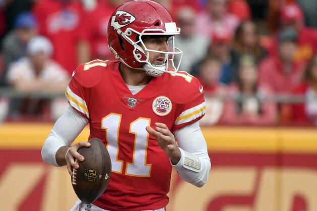 Kansas City Chiefs quarterback Alex Smith (11) looks for a receiver during the first half of an NFL football game against the Buffalo Bills in Kansas City, Mo., Sunday, Nov. 26, 2017. (AP Photo/Ed Zurga)