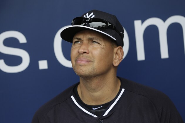 FILE - In this Feb. 26, 2015, file photo, New York Yankees' Alex Rodriguez sits in the dugout during a spring training baseball workout in Tampa, Fla. Rodriguez is back on the field for the New York Yankees in his new role as an instructor.  A-Rod arrived Friday, Sept. 30, 2016, at the Yankees' minor league complex in Tampa, to work with prospects taking part in instructional league.  (AP Photo/Lynne Sladky, File)