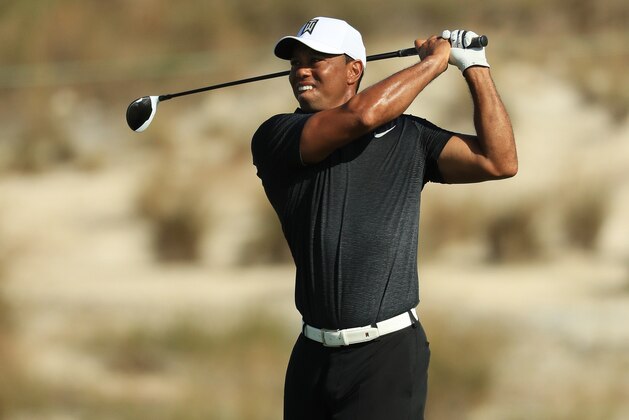 NASSAU, BAHAMAS - NOVEMBER 30:  Tiger Woods of the United States plays a shot on the ninth hole during the first round of the Hero World Challenge at Albany, Bahamas on November 30, 2017 in Nassau, Bahamas.  (Photo by Mike Ehrmann/Getty Images)