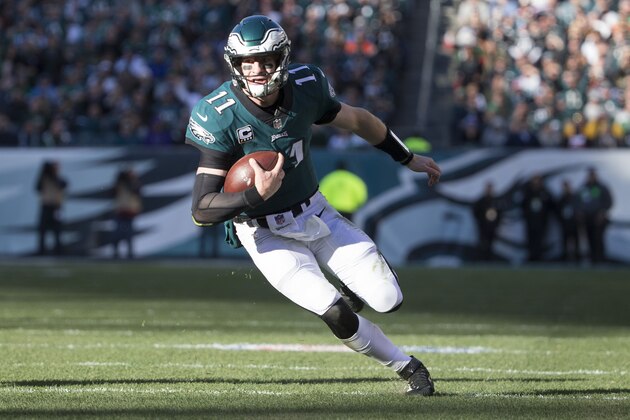 PHILADELPHIA, PA - NOVEMBER 26: Carson Wentz #11 of the Philadelphia Eagles runs with the ball against the Chicago Bears at Lincoln Financial Field on November 26, 2017 in Philadelphia, Pennsylvania. (Photo by Mitchell Leff/Getty Images) PHILADELPHIA, PA - NOVEMBER 26: Carson Wentz #11 of the Philadelphia Eagles runs with the ball against the Chicago Bears at Lincoln Financial Field on November 26, 2017 in Philadelphia, Pennsylvania. (Photo by Mitchell Leff/Getty Images)