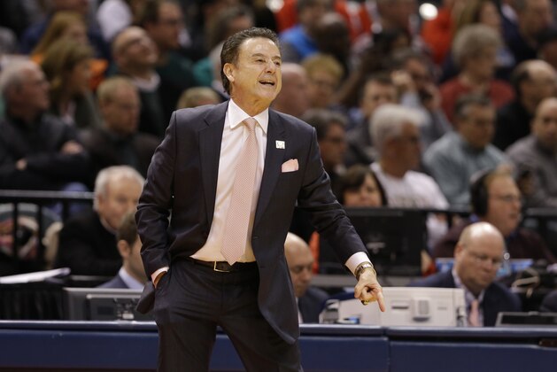 Louisville head coach Rick Pitino yells to his team from the sideline during the first half of a first-round game against Jacksonville State in the men's NCAA college basketball tournament in Indianapolis, Friday, March 17, 2017. (AP Photo/Michael Conroy)