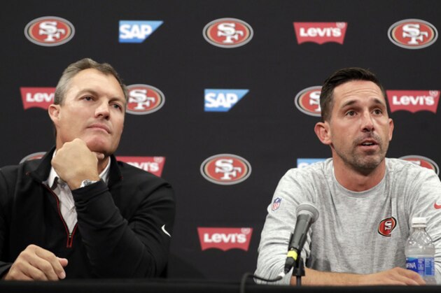 San Francisco 49ers head coach Kyle Shanahan, right, and general manager John Lynch field questions during the NFL team's football training camp Thursday, July 27, 2017, in Santa Clara, Calif. (AP Photo/Marcio Jose Sanchez)