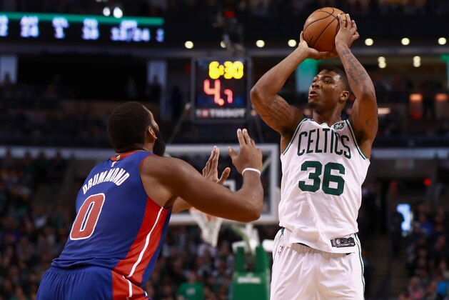 BOSTON, MA - NOVEMBER 27:  Marcus Smart #36 of the Boston Celtics shoots during the game against the Detroit Pistons at TD Garden on November 27, 2017 in Boston, Massachusetts. NOTE TO USER: User expressly acknowledges and agrees that, by downloading and or using this photograph, User is consenting to the terms and conditions of the Getty Images License Agreement.  (Photo by Omar Rawlings/Getty Images)