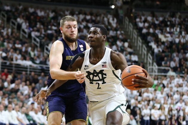 EAST LANSING, MI - NOVEMBER 30: Jaren Jackson Jr. #2 of the Michigan State Spartans drives to the basket against Elijah Burns #12 of the Notre Dame Fighting Irish at Breslin Center on November 30, 2017 in East Lansing, Michigan. (Photo by Rey Del Rio/Getty Images)