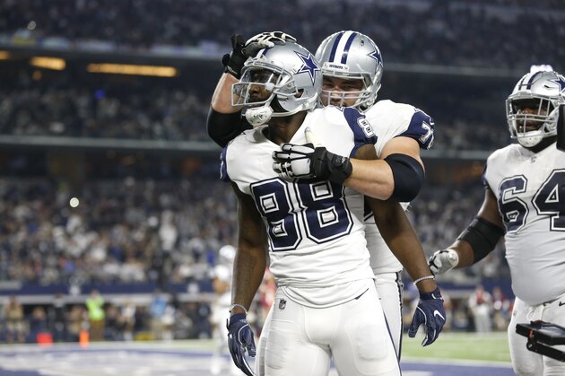 Dallas Cowboys wide receiver Dez Bryant (88) and guard Zack Martin, rear, celebrate a touchdown scored on a catch by Bryant in the second half of an NFL football game against the Washington Redskins on Thursday, Nov. 30, 2017, in Arlington, Texas. (AP Photo/Ron Jenkins)