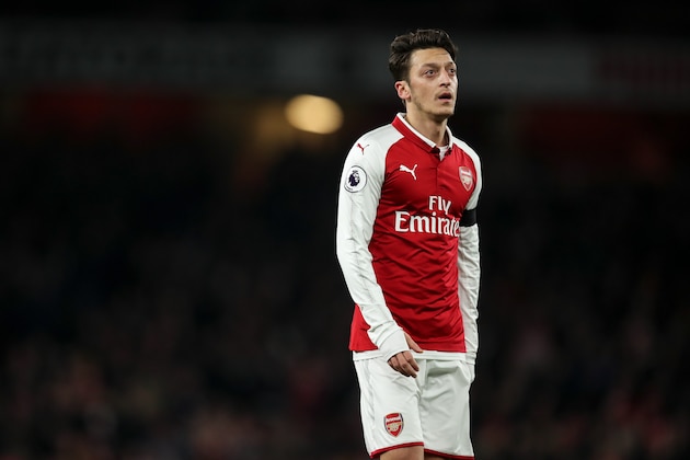 LONDON, ENGLAND - NOVEMBER 29: Mesut Ozil of Arsenal during the Premier League match between Arsenal and Huddersfield Town at Emirates Stadium on November 28, 2017 in London, England. (Photo by Robbie Jay Barratt - AMA/Getty Images)