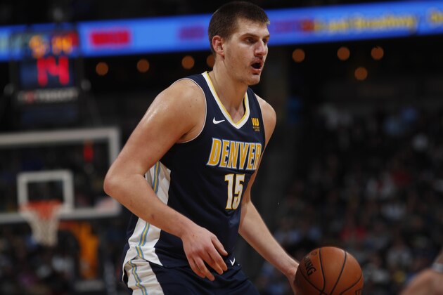 Denver Nuggets center Nikola Jokic (15) in the second half of an NBA basketball game Friday, Nov. 24, 2017, in Denver. The Nuggets won 104-92. (AP Photo/David Zalubowski)