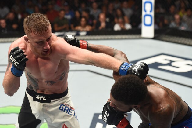 LAS VEGAS, NV - JULY 07:  (L-R) Justin Gaethje punches Michael Johnson after their lightweight bout during The Ultimate Fighter Finale at T-Mobile Arena on July 7, 2017 in Las Vegas, Nevada.  (Photo by Brandon Magnus/Zuffa LLC/Zuffa LLC via Getty Images)