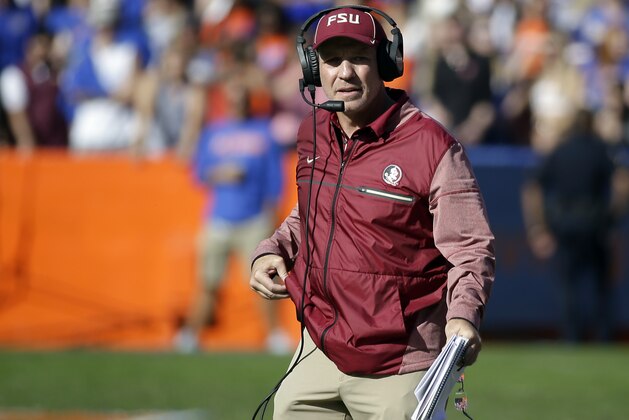 Florida State head coach Jimbo Fisher watches play against Florida during the second half of an NCAA college football game, Saturday, Nov. 25, 2017, in Gainesville, Fla. Florida State won 38-22. (AP Photo/John Raoux)
