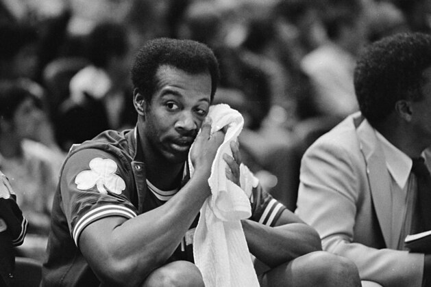 Boston Celtics Kermit Washington, playing his first game since Dec. 9 altercation with Rudy Tomjanovich of Houston. Washington wipes his brow following first play action in second quarter against the Golden State Warriors at Oakland, Calif., Tuesday night, Feb. 15, 1978. Celtics won, 98-75. (AP Photo)