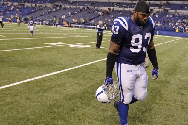 Indianapolis Colts' Dwight Freeney walks off the field after Jacksonville Jaguars defeated the Colts 17-3 in an NFL football game Sunday, Nov. 13, 2011, in Indianapolis. (AP Photo/Michael Conroy)