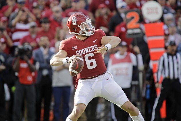 NORMAN, OK - NOVEMBER 25: Quarterback Baker Mayfield #6 of the Oklahoma Sooners looks to throw against the West Virginia Mountaineers at Gaylord Family Oklahoma Memorial Stadium on November 25, 2017 in Norman, Oklahoma. Oklahoma defeated West Virginia 59-31. (Photo by Brett Deering/Getty Images)