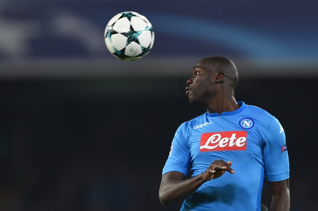 Napoli's defender from France Kalidou Koulibaly jumps for the ball during the UEFA Champions League football match Napoli vs Manchester City on November 1, 2017 at the San Paolo stadium in Naples.  / AFP PHOTO / Filippo MONTEFORTE        (Photo credit should read FILIPPO MONTEFORTE/AFP/Getty Images)