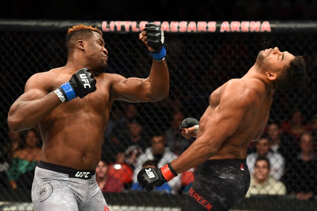 DETROIT, MI - DECEMBER 02:  (L-R) Francis Ngannou of Cameroon punches Alistair Overeem of The Netherlands in their heavyweight bout during the UFC 218 event inside Little Caesars Arena on December 02, 2017 in Detroit, Michigan. (Photo by Josh Hedges/Zuffa LLC/Zuffa LLC via Getty Images)