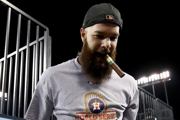 LOS ANGELES, CA - NOVEMBER 01:  Dallas Keuchel #60 of the Houston Astros celebrates after defeating the Los Angeles Dodgers 5-1 in game seven to win the 2017 World Series at Dodger Stadium on November 1, 2017 in Los Angeles, California.  (Photo by Ezra Shaw/Getty Images)