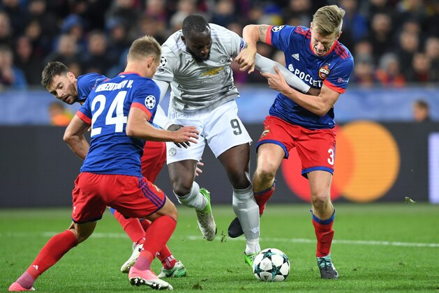 From L: CSKA Moscow's defender from Russia Georgy Shchennikov, CSKA Moscow's defender from Russia Vasily Berezutskiy, Manchester United's forward from Belgium Romelu Lukaku and CSKA Moscow's midfielder from Sweden Pontus Wernbloom vie for the ball during the UEFA Champions League Group A football match between PFC CSKA Moscow and Manchester United FC in Moscow on September 27, 2017. / AFP PHOTO / Yuri KADOBNOV        (Photo credit should read YURI KADOBNOV/AFP/Getty Images)
