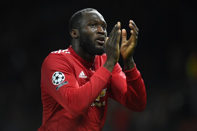Manchester United's Belgian striker Romelu Lukaku applauds supporters after the UEFA Champions League Group A football match between Manchester United and Benfica at Old Trafford in Manchester, north west England on October 31, 2017.
Manchester United won the game 2-0. / AFP PHOTO / Oli SCARFF        (Photo credit should read OLI SCARFF/AFP/Getty Images)