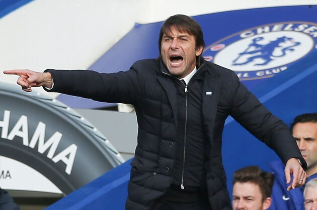 Chelsea's Italian head coach Antonio Conte shouts instructions to his players from the touchline during the English Premier League football match between Chelsea and Newcastle United at Stamford Bridge in London on December 2, 2017. / AFP PHOTO / Daniel LEAL-OLIVAS / RESTRICTED TO EDITORIAL USE. No use with unauthorized audio, video, data, fixture lists, club/league logos or 'live' services. Online in-match use limited to 75 images, no video emulation. No use in betting, games or single club/league/player publications.  /         (Photo credit should read DANIEL LEAL-OLIVAS/AFP/Getty Images)