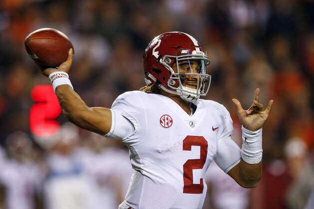 Alabama quarterback Jalen Hurts (2) throws a pass during the second half of the Iron Bowl NCAA college football game against Auburn, Saturday, Nov. 25, 2017, in Auburn, Ala. (AP Photo/Butch Dill)