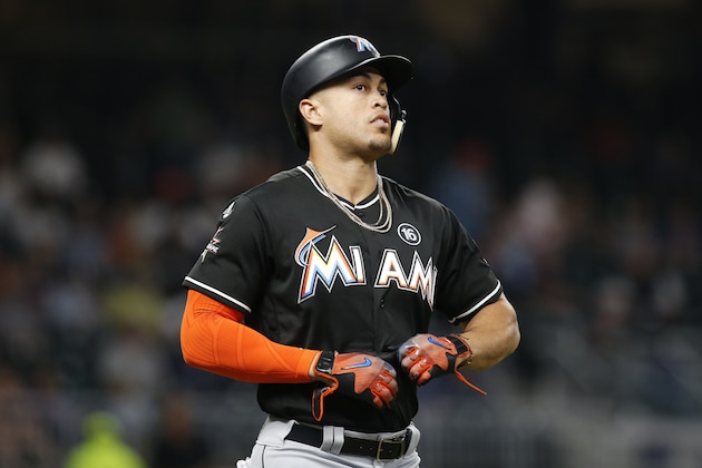 Miami Marlins' Giancarlo Stanton walks in the seventh inning of a baseball game against the Atlanta Braves, Thursday, Sept. 7, 2017, in Atlanta. (AP Photo/Brett Davis)