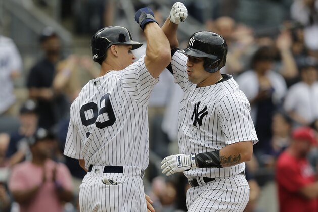 New York Yankees' Gary Sanchez, right, celebrates this three-run homer with Aaron Judge during the fifth inning of the baseball game at Yankee Stadium Sunday, June 25, 2017 in New York. (AP Photo/Seth Wenig)