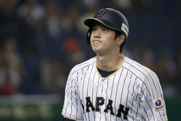Japan's pinch hitter Shohei Otani reacts after a strikeout swinging in the eighth inning of an international exhibition series baseball game against Mexico at Tokyo Dome in Tokyo Thursday, Nov. 10, 2016. (AP Photo/Shizuo Kambayashi)