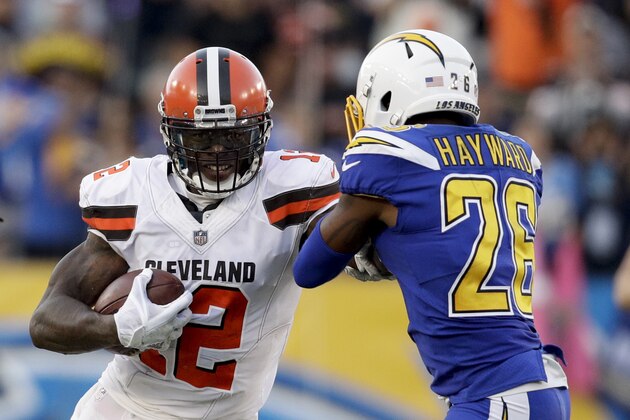 Cleveland Browns wide receiver Josh Gordon runs against Los Angeles Chargers cornerback Casey Hayward during the second half of an NFL football game Sunday, Dec. 3, 2017, in Carson, Calif. (AP Photo/Jae C. Hong)