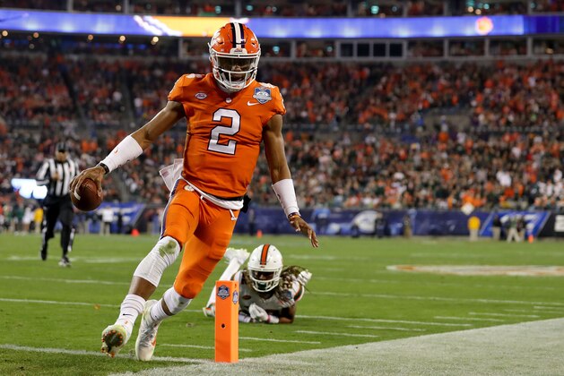 CHARLOTTE, NC - DECEMBER 02:  Kelly Bryant #2 of the Clemson Tigers scores a touchdown against the Miami Hurricanes in the first quarter during the ACC Football Championship at Bank of America Stadium on December 2, 2017 in Charlotte, North Carolina.  (Photo by Streeter Lecka/Getty Images)