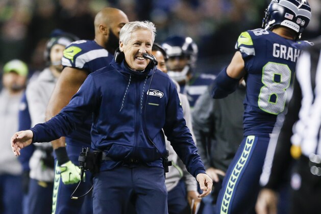 SEATTLE, WA - DECEMBER 03: Seattle Seahawks head coach Pete Carroll greets Jimmy Graham #88 after his touchdown in the first quarter against the Philadelphia Eagles at CenturyLink Field on December 3, 2017 in Seattle, Washington. (Photo by Otto Greule Jr /Getty Images)
