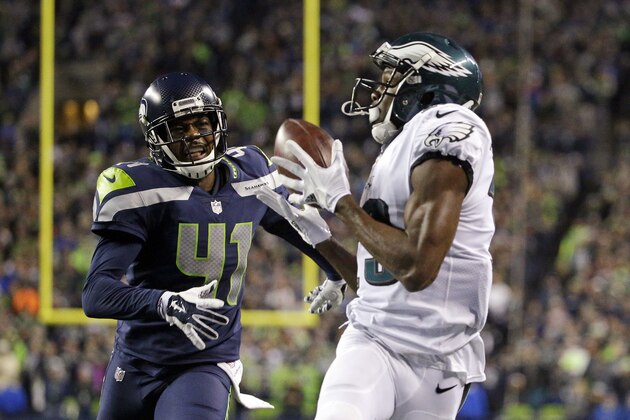 Philadelphia Eagles' Nelson Agholor grabs a pass for a touchdown as Seattle Seahawks' Byron Maxwell trails in the second half of an NFL football game, Sunday, Dec. 3, 2017, in Seattle. (AP Photo/Ted S. Warren)
