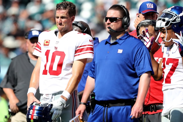 PHILADELPHIA, PA - SEPTEMBER 24:  Eli Manning #10 of the New York Giants and head coach Ben McAdoo wait for the review on a touchdown scored in the second quarter by the New York Giants  on September 24, 2017  at Lincoln Financial Field in Philadelphia, Pennsylvania.The touchdown was called back and the New York Giants did not score on the possession against the Philadelphia Eagles.  (Photo by Elsa/Getty Images)