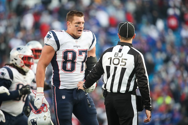 ORCHARD PARK, NY - DECEMBER 3:  Rob Gronkowski #87 of the New England Patriots talks with back judge Dino Paganelli #105 during the fourth quarter against the Buffalo Bills on December 3, 2017 at New Era Field in Orchard Park, New York.  (Photo by Tom Szczerbowski/Getty Images)