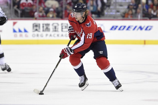 Washington Capitals center Nicklas Backstrom (19), of Sweden, skates with the puck during the second period of an NHL hockey game against the Los Angeles Kings, Thursday, Nov. 30, 2017, in Washington. (AP Photo/Nick Wass)