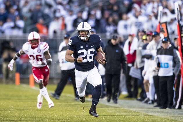 UNIVERSITY PARK, PA - NOVEMBER 18:  Saquon Barkley #26 of the Penn State Nittany Lions carries the ball on a touchdown run during the first quarter against the Nebraska Cornhuskers on November 18, 2017 at Beaver Stadium in University Park, Pennsylvania. Penn State defeats Nebraska 56-44.  (Photo by Brett Carlsen/Getty Images)
