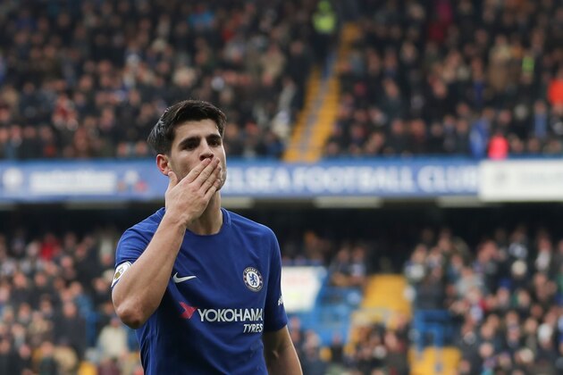 Chelsea's Spanish striker Alvaro Morata celebrates scoring his team's second goal during the English Premier League football match between Chelsea and Newcastle United at Stamford Bridge in London on December 2, 2017. / AFP PHOTO / Daniel LEAL-OLIVAS / RESTRICTED TO EDITORIAL USE. No use with unauthorized audio, video, data, fixture lists, club/league logos or 'live' services. Online in-match use limited to 75 images, no video emulation. No use in betting, games or single club/league/player publications.  /         (Photo credit should read DANIEL LEAL-OLIVAS/AFP/Getty Images)