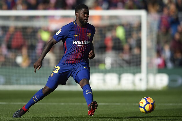 BARCELONA, SPAIN - DECEMBER 02:  Samuel Umtiti of Barcelona in action during the La Liga match between Barcelona and Celta de Vigo at Camp Nou on December 2, 2017 in Barcelona, Spain.  (Photo by Manuel Queimadelos Alonso/Getty Images)