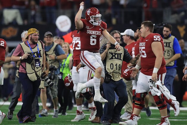 ARLINGTON, TX - DECEMBER 02:  Baker Mayfield #6 of the Oklahoma Sooners celebrates after winning the Big 12 Championship against the TCU Horned Frogs at AT&T Stadium on December 2, 2017 in Arlington, Texas.  (Photo by Ronald Martinez/Getty Images)