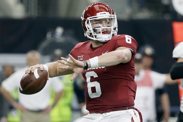 FILE - In this Dec. 2, 2017, file photo, Oklahoma quarterback Baker Mayfield (6) throws a pass in the first half of the Big 12 Conference championship NCAA college football game against TCU  in Arlington, Texas. Mayfield, reigning Heisman winner Lamar Jackson of Louisville and Stanford running back Bryce Love were chosen as finalists for the Heisman Trophy on Monday, Dec. 4, 2017. (AP Photo/Tony Gutierrez, File)