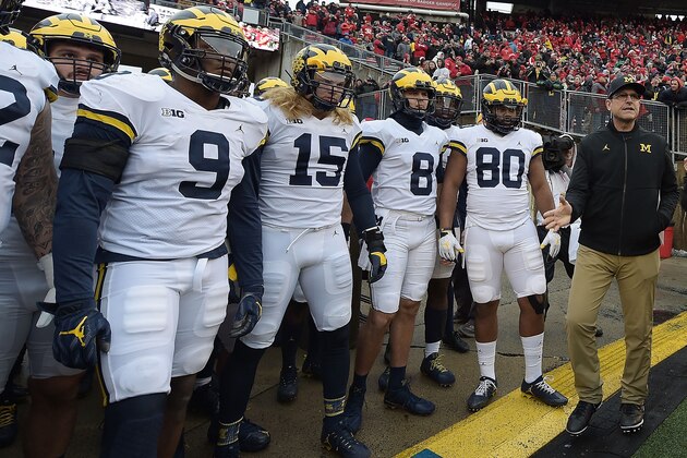 MADISON, WI - NOVEMBER 18:  Head coach Jim Harbaugh of the Michigan Wolverines prepares to take the field with his team prior to a game against the Wisconsin Badgers at Camp Randall Stadium on November 18, 2017 in Madison, Wisconsin.  (Photo by Stacy Revere/Getty Images)